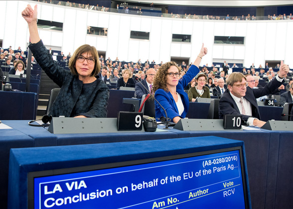 The European Parliament approves and signs the climate deal.