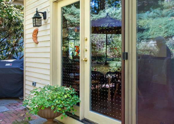 Vinyl dots placed in a dense pattern on residential glass doors.