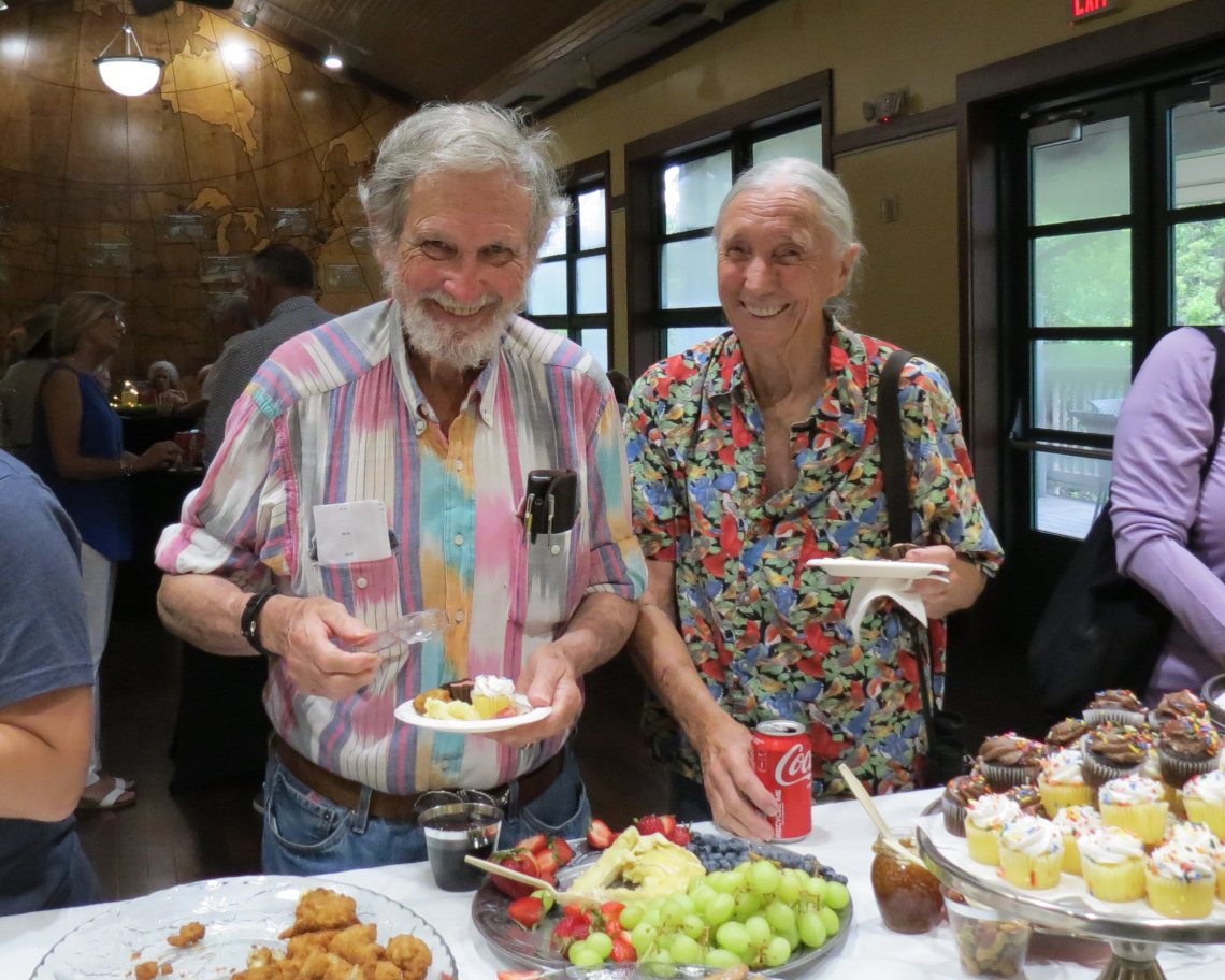 People enjoying food at a table