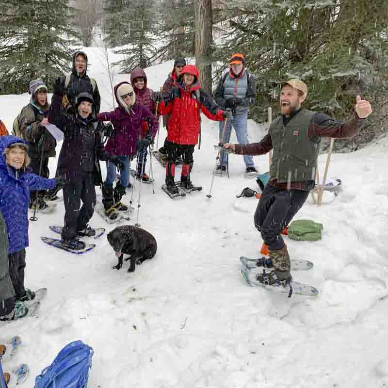 Volunteers and Community Naturalist Keith Bruno celebrate the snow. Photo: Roger Organ.