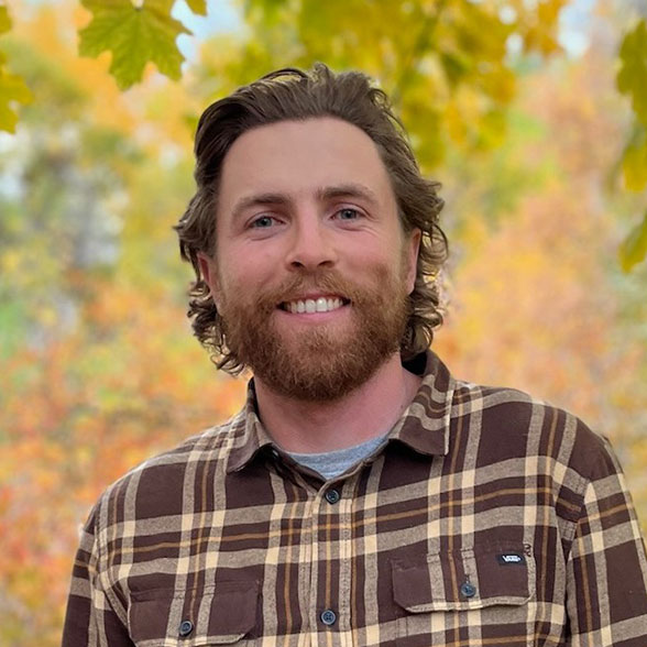 A portrait of Zach Higgins.