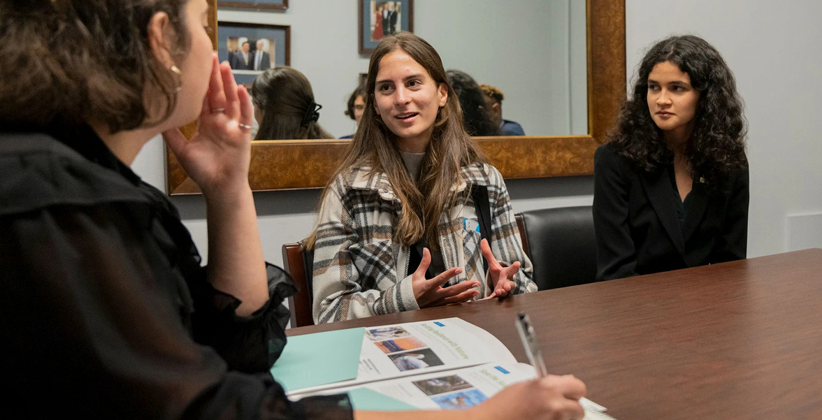 Audubon on Campus member, Sonia Stan (center) speaks to Hon. Brad Sherman's (D-CA) Legislative Aid, Emma Silver (left), during the National Audubon Society Seabird Fly-In on Capitol Hill in Washington, DC on October 17, 2023.