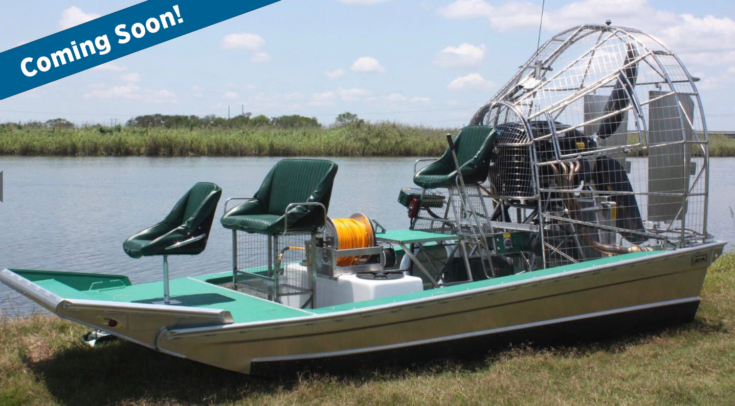 An airboat next to a lake