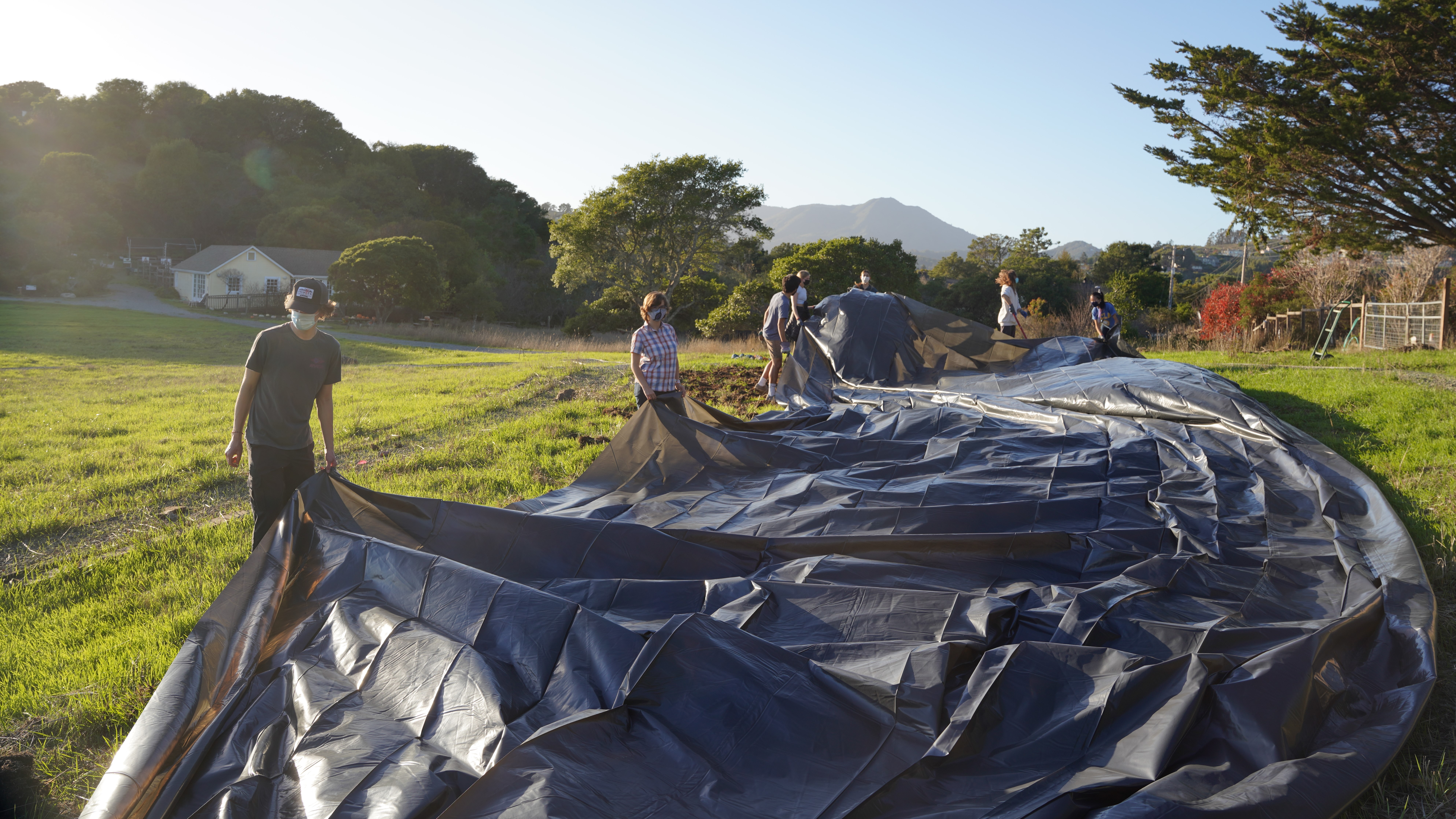 Audubon Youth Leaders Install Silage Tarp