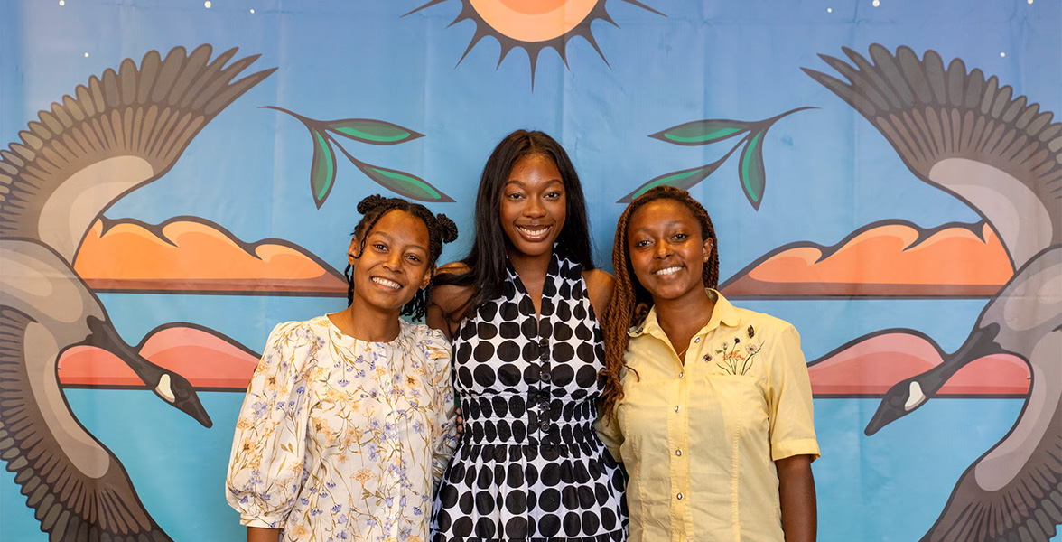 From left, Aminah Coleman, Jordan McKnight, and Sydney Sauls pose for a photo at the 2025 Audubon Leadership Conference in Montréal, Canada.