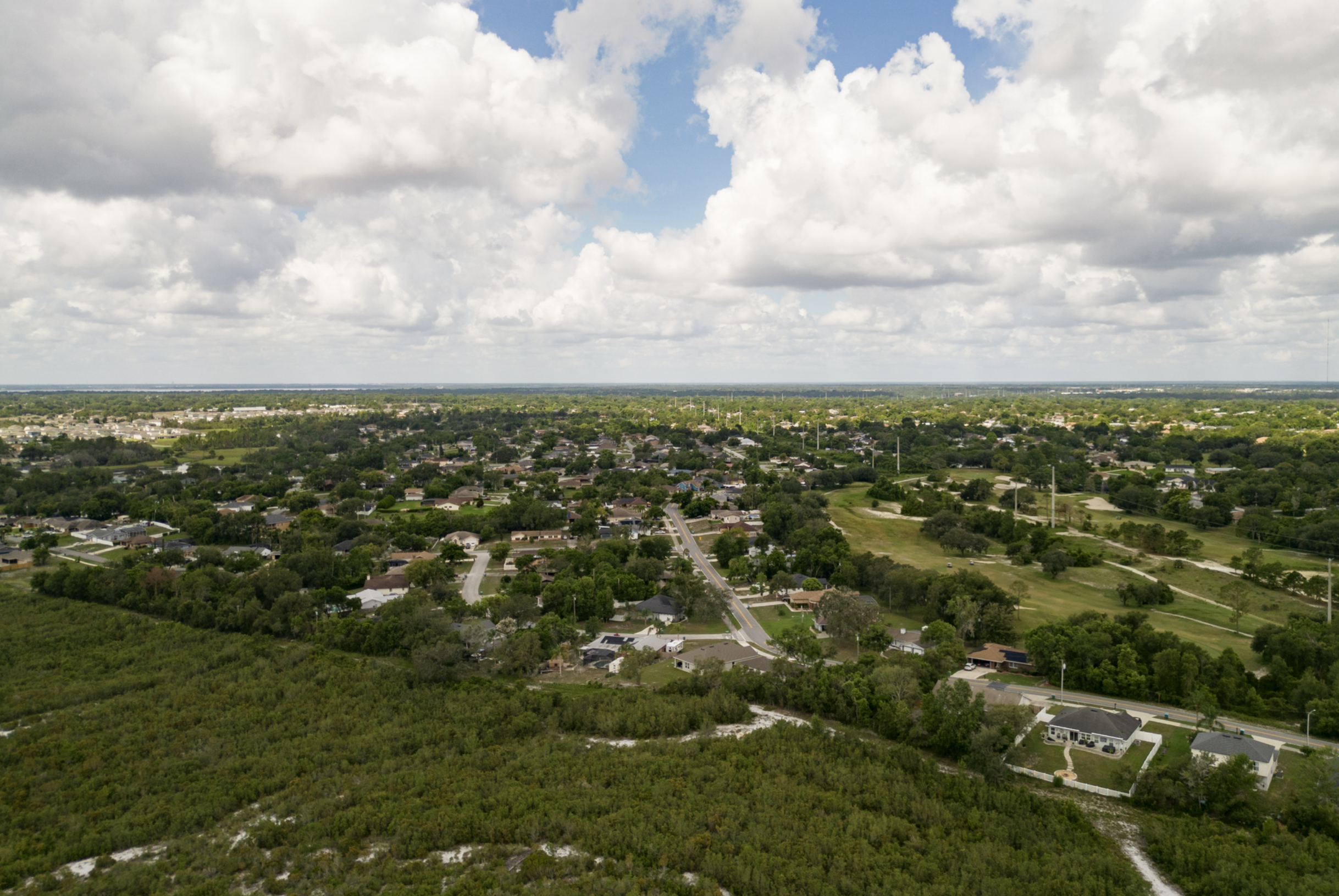 aerial view of development next to a protected area