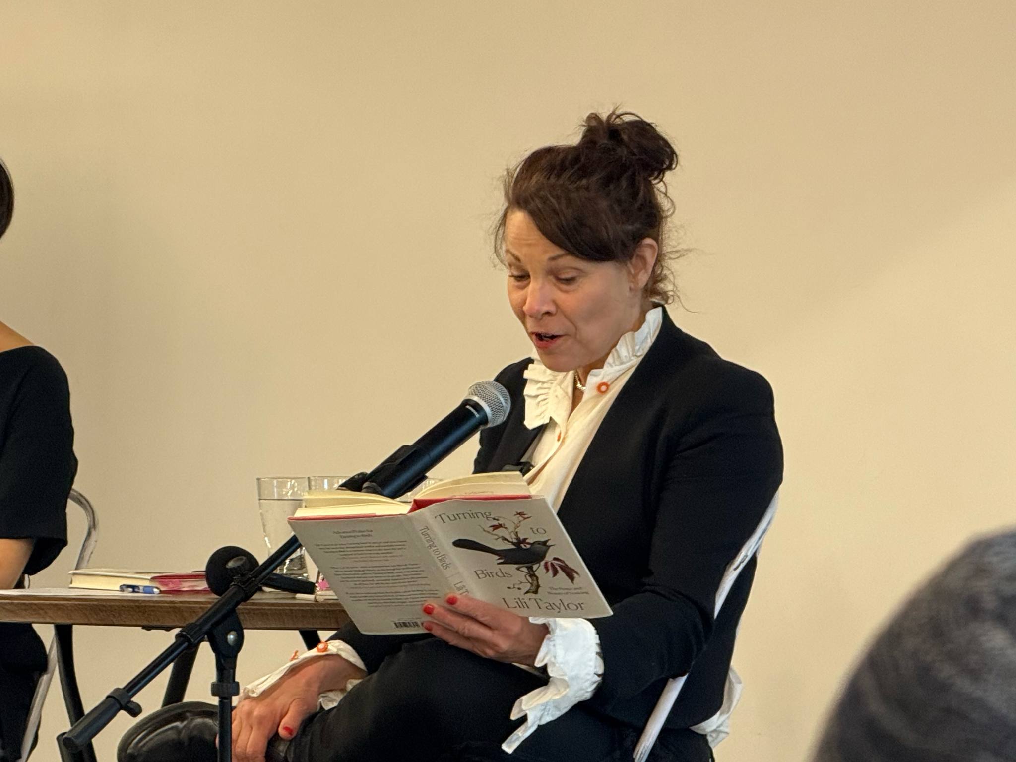Lili Taylor reading from her book. 