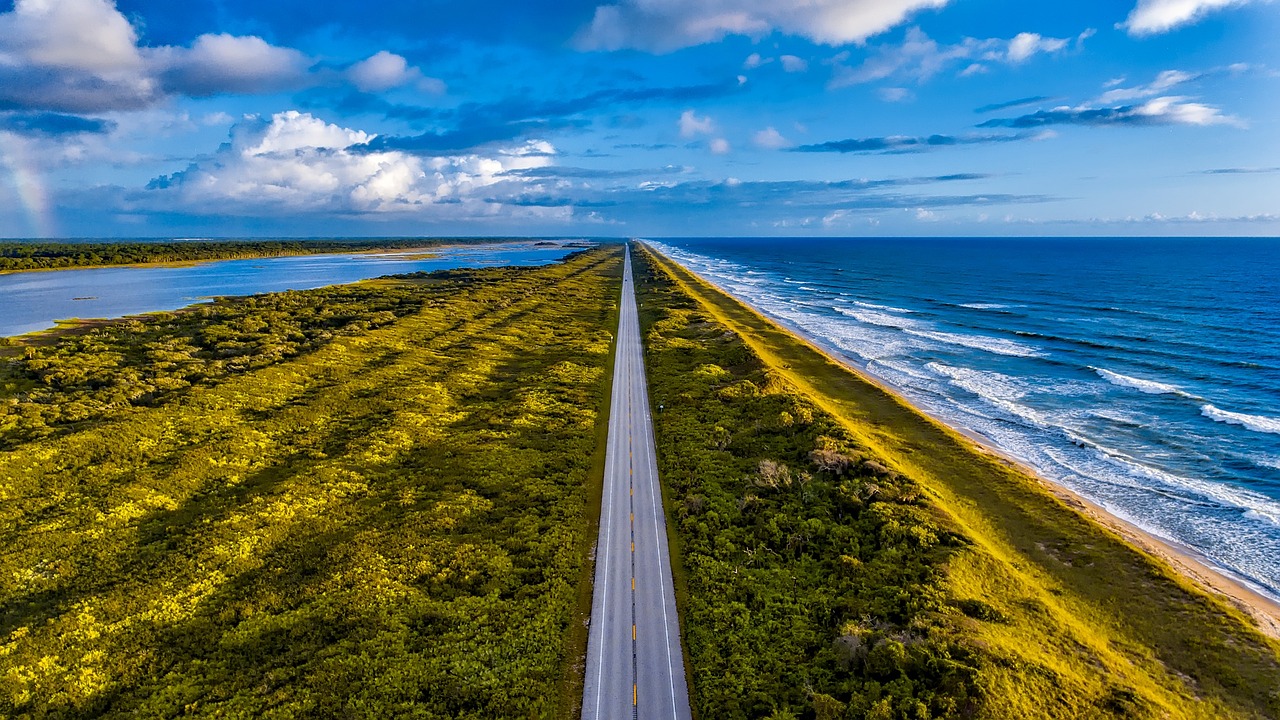 a road between two bodies of water