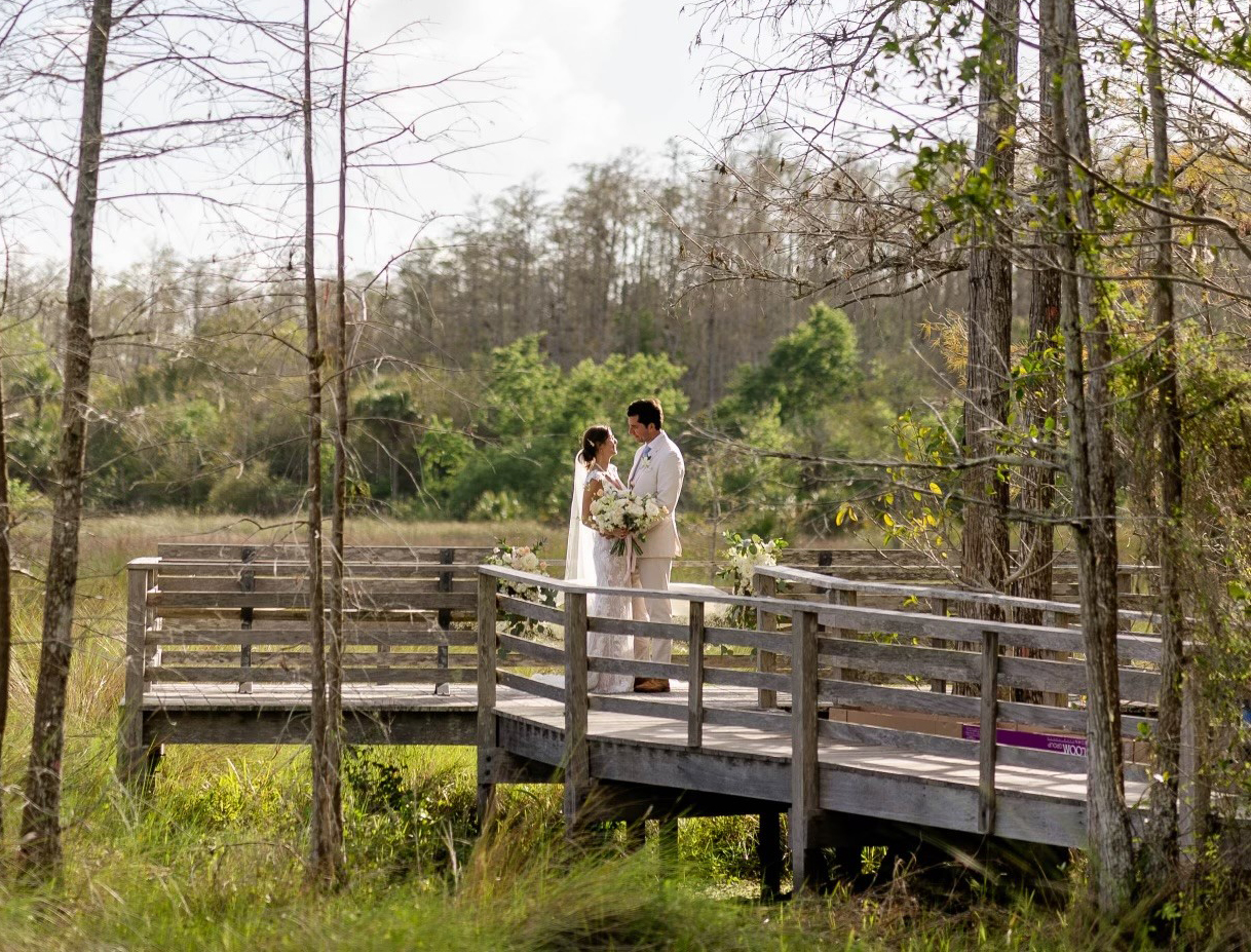 A bride and groom on the boardwalk